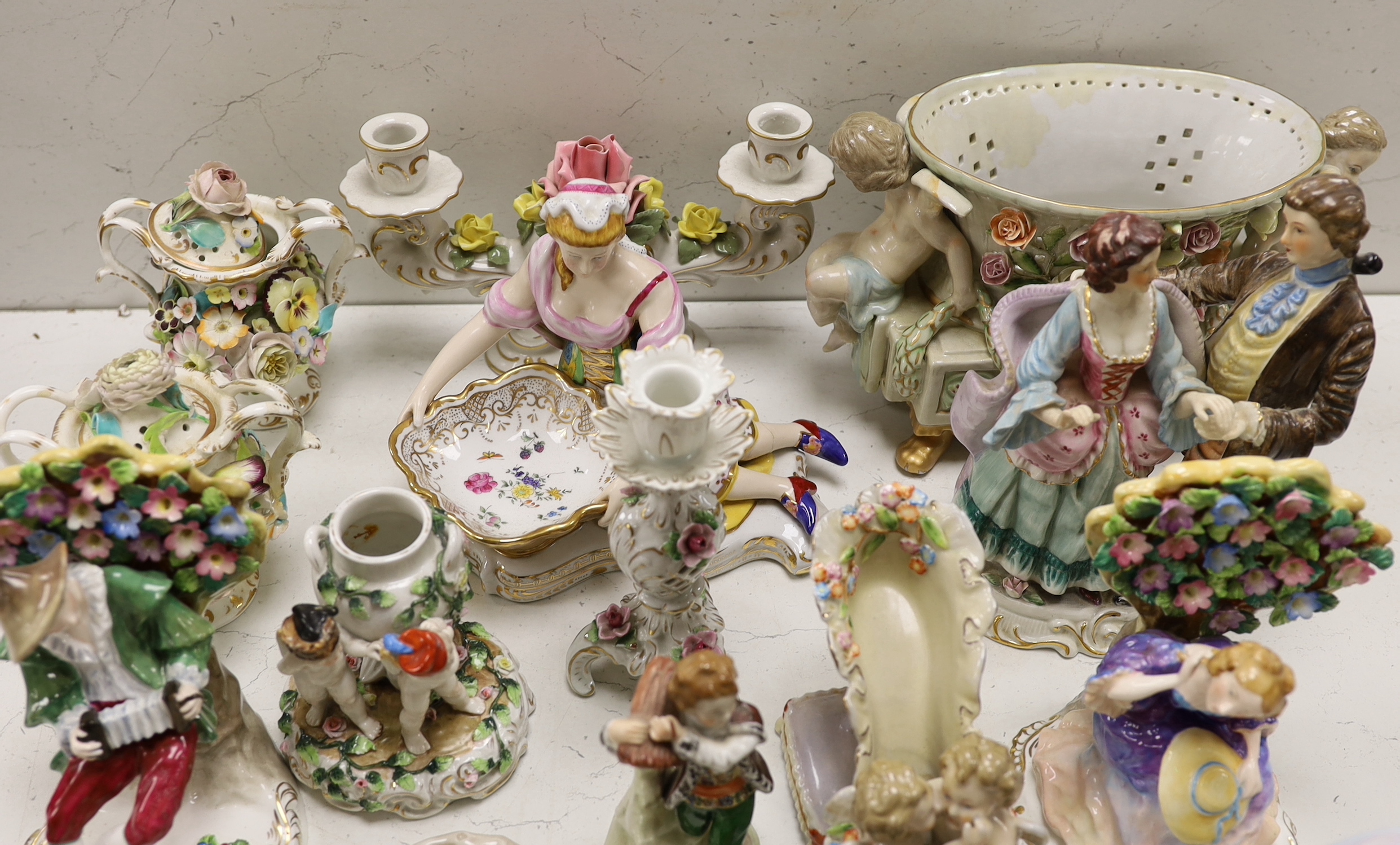 A large group of mainly continental table wares and figurines